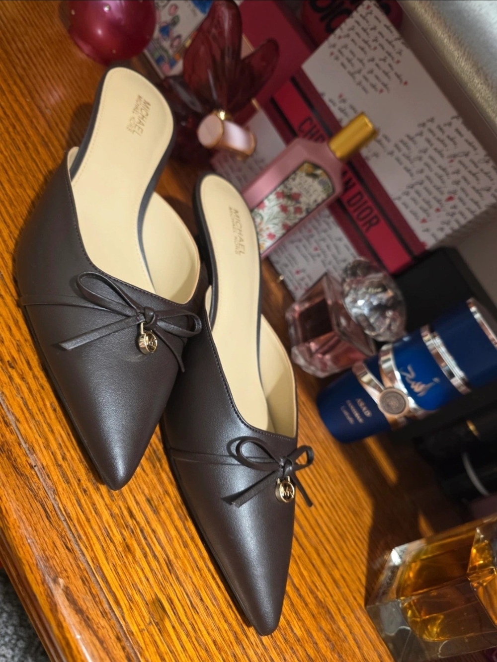 Michael Kors Pointed Toe Slip-On Mules in Dark Brown with Gold Charm